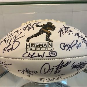 20 Heisman Trophy winner signed football.